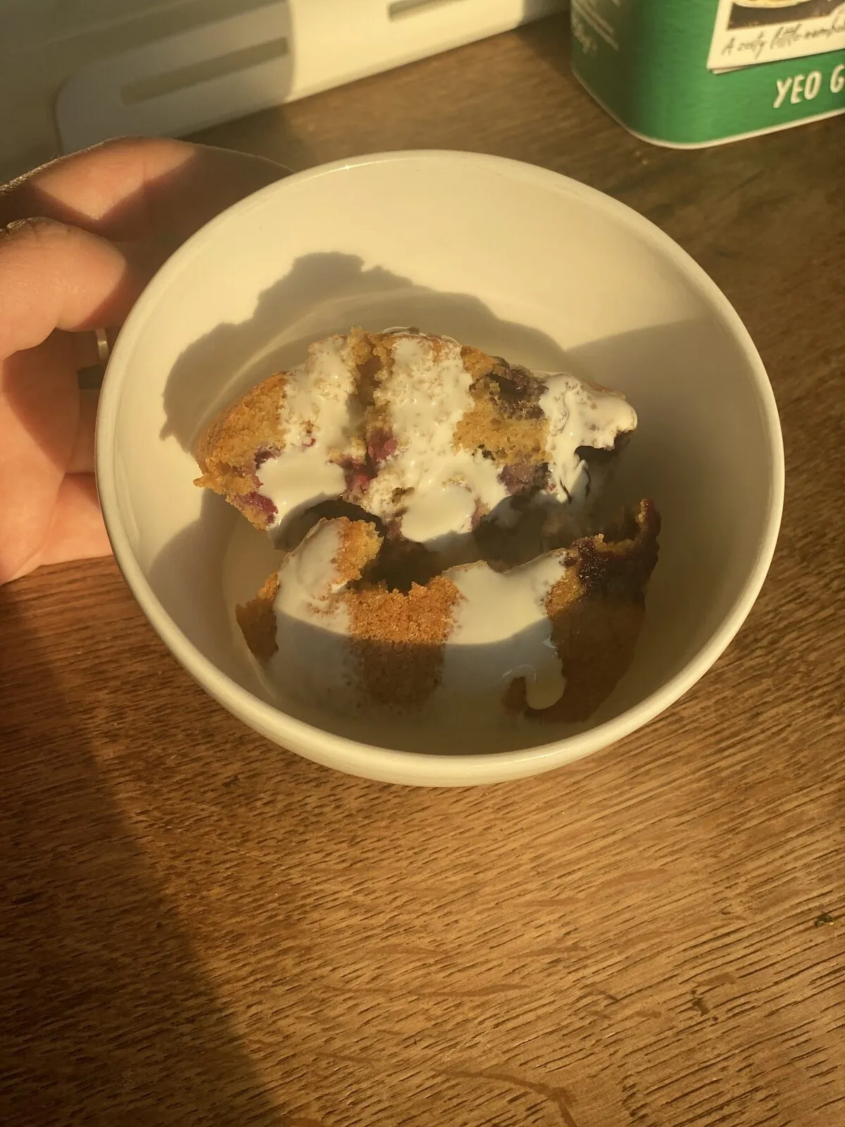 Lemon and blueberry muffins served with cream